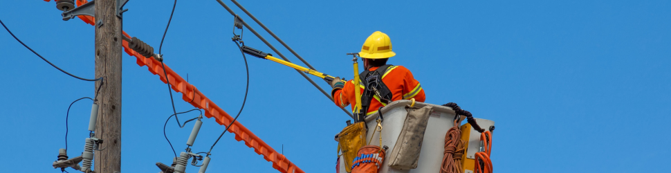 Infrastructure workers reviewing asset and capital planning data on site, highlighting the risks of spreadsheet-driven planning