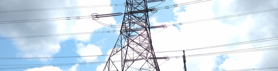 Electricity grid infrastructure with power lines, representing utility planning and scenario modeling for future energy demands