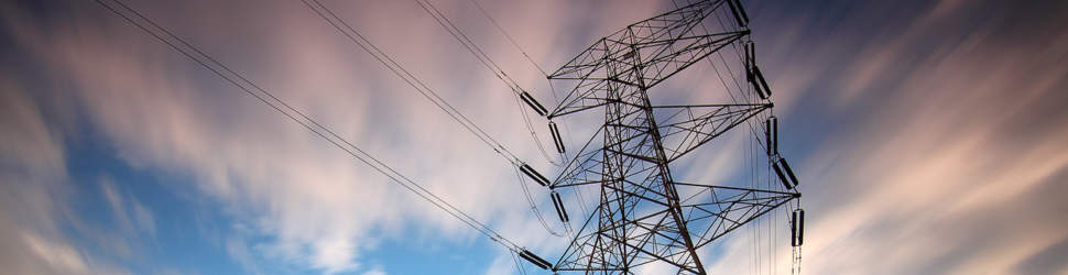 Illustration representing utility capital planning and regulatory intelligence for electric and gas utilities, focused on regulatory scrutiny, investment planning, and evidence-based decision-making.